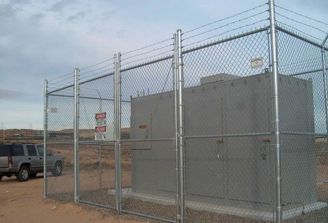 Security Fencing with Barbed Tape Tops